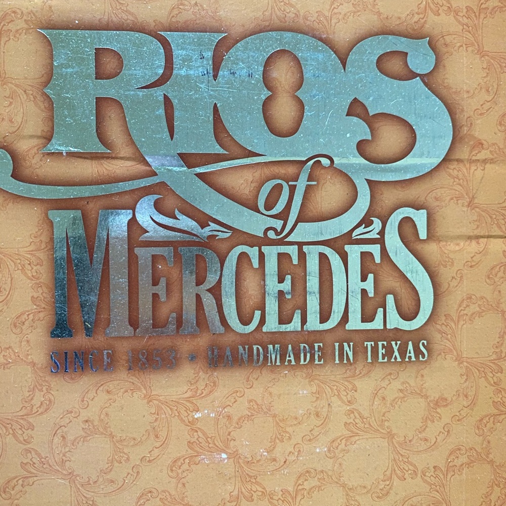 Rips of Mercedes men’s boots